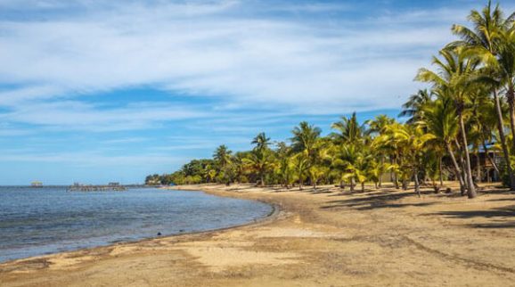 The beautiful beach of Sandy Bay on Roatan Island. Honduras